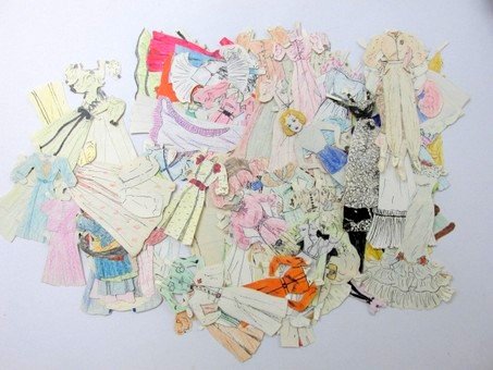 Large Assortment of Early Paper Dolls: Large assortment of early paper dolls in various sizes, factory made, hand colored and handmade are all included, tallest is about 9" H