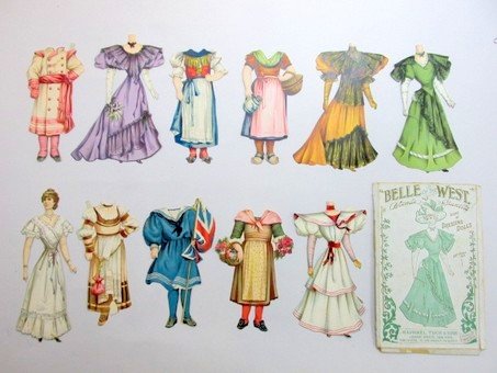 Two Raphael Tuck Sets plus Dye-Cut dolls: Two Raphael Tuck sets in original boxes plus two dye-cut jointed dolls, Belle Of The West 9.5" H doll with eight costumes in original envelope, Lordly Lionel 9" H doll with four costumes and five hats