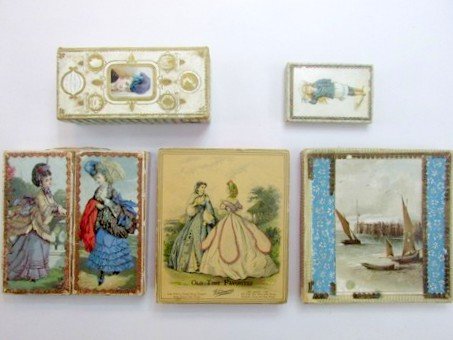 Five Early Decorative Boxes: Five circa 1900 decorated boxes perfect for storing paper dolls, originally held linens and candy, largest is 8" by 8"