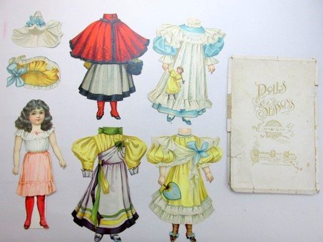 Two Early Raphael Tuck Sets: Two early Raphael Tuck sets, Dolls For All Seasons Sweet Alice 13" H has four costumes and original box, Graceful Gertrude 10" H has four costumes and four hats