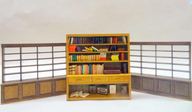 Dollhouse Bookcases: One Warren Dick bookcase & 2 commercial bookcases plus an assortment of blank books, 8 1/2in. Tallest