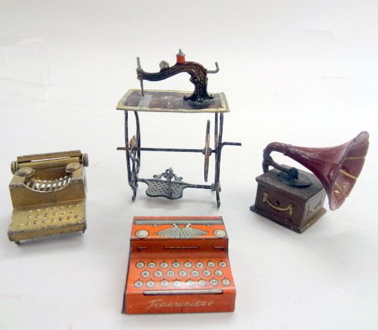 German Penny Toys: German miniature sewing machine, gramaphone w/morning glory horn, 2 typewriters, 2 1/2in. Tallest