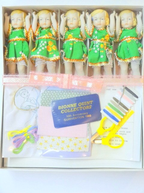 Dionne Quint Collectors 10th Anniversary Quinvention: Mint, in original box, Quint Collectors anniversary souvenir set, 5-6in. All bisque dolls, molded hair w/molded blue bows, patterns, fabric, instructions for clothes, sticker on lid Dionne Quint 10th 