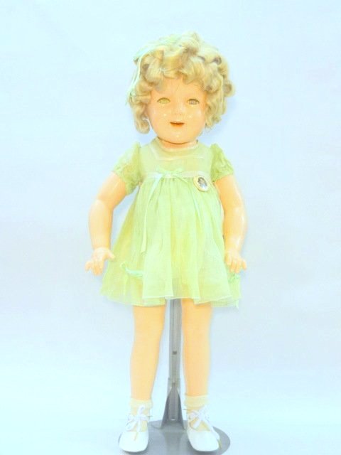 Shirley Temple 27 inch Original Clothes Doll: Ideal 27in. Shirley Temple, all composition, sleep eyes, open mouth, dimpled cheeks, original tagged dress, pin, replaced shoes & socks