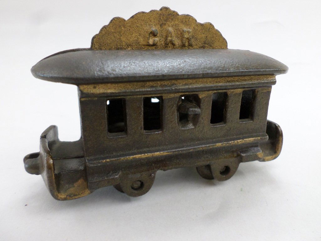 Cast Iron Trolley Bank: Antique cast iron trolley bank, japarred body w/gold marquee & pinstripes 4 1/2in. (L)