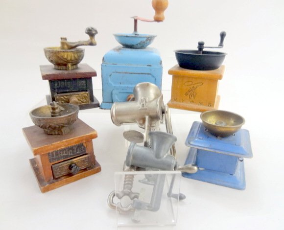 Miniature Coffee Grinders and Food Choppens: Little Tot, Daisy, and three other coffee grinders, two metal food choppers, 5 1/4in tallest