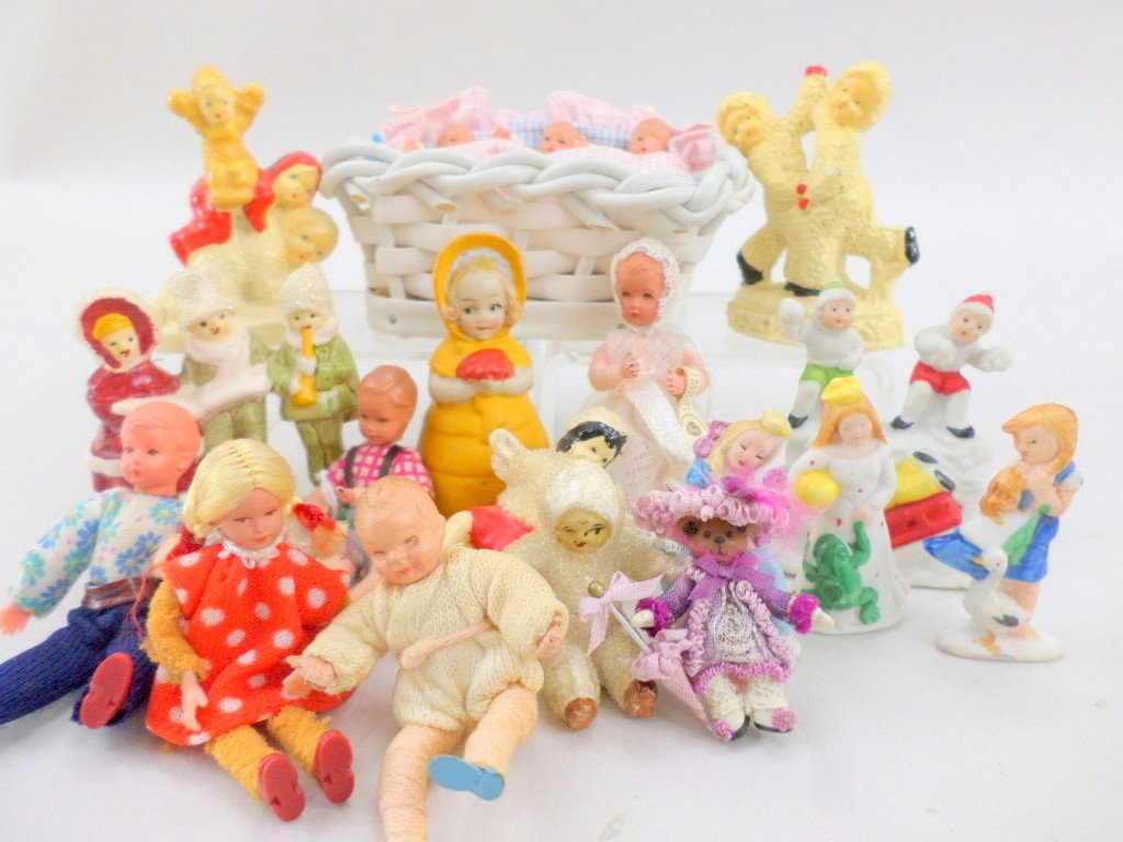 Snow Babies and other Tiny Babies Dolls: Large grouping 17 pcs. Miniature figures, babies in crib, German Snow Baby figure, other bisque figure, 2 1/2in. Tallest