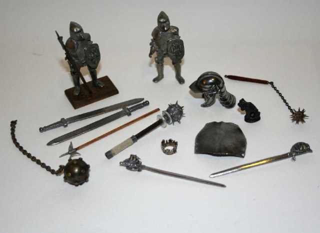 And Punishment Weapons Dollhouse Miniatures: An assortment of medieval weaponry and armor. The mace is 2.5" L and very sharp! To each his own.