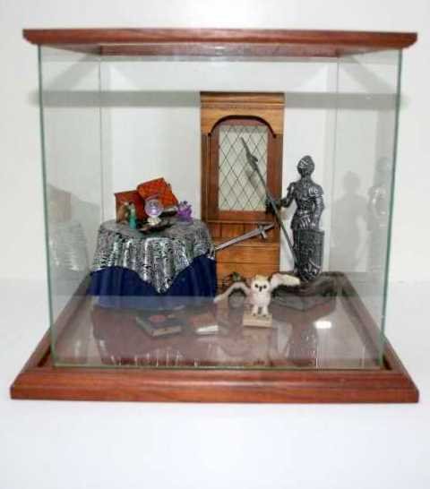 Something Spooky Dollhouse Miniatures: Glass-enclosed vignette featuring a suit of armor 5.5" to tip of halberd, a Carlson window seat 6.75" H, and accessories suitable for a room at Hogwarts: crystal ball, , bat and rat, creepy books and