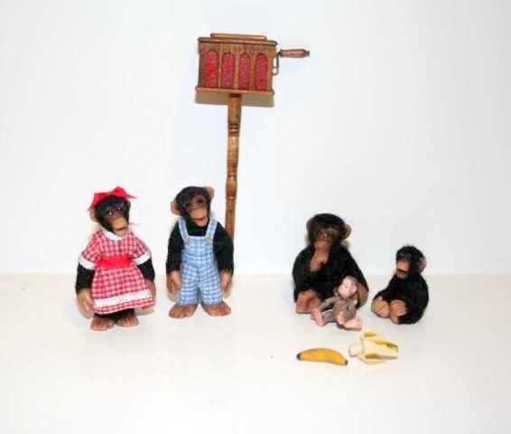 Monkey Business: A collection of very realistic chimpanzees, two dressed, by Todd Kruger 1.75" H, also a small jointed chimp and a hand organ in search of an organ grinder. Oh well.