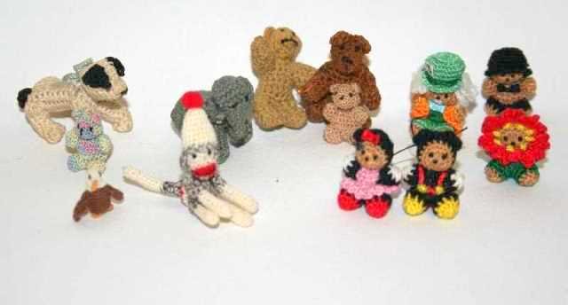 Knit and Crochet Stuffed Animals: Handcrafted sock monkey 1.25" H, puppy, elephant, Minnie and Mickey, and assorted animals, two very tiny, all made of knit or crochet thread. Amazing!