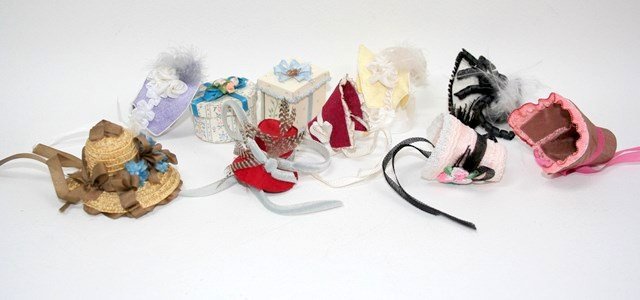 Historical Hats: A selection of eight artisan 19th century style bonnets and two hatboxes, with very flowery decorations and no shortage of ribbons. Very Austen-esque.