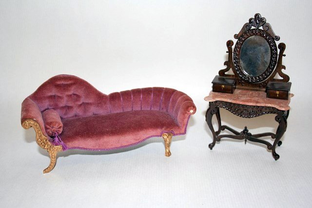 Bonnie Sanford Victoriana: An luxurious velvet chaise with tufted upholstery 3.5" H, 7" L (one rear leg reglued, glue spot on roll pillow, one button cover missing) and a marble-topped dressing table with carved mirror and apro