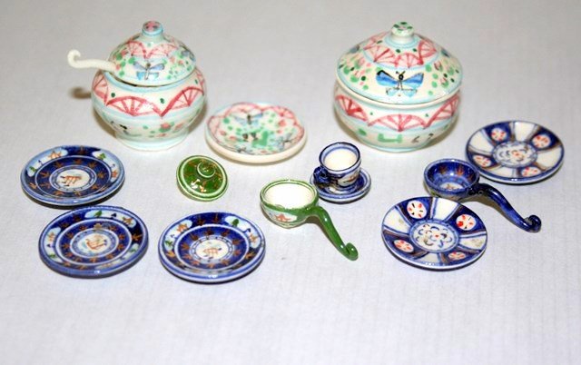 Elizabeth Chambers Mixed China: An generous assortment of incomplete dinnerware sets including three pieces from her colorful butterfly pattern (covered bowl has a tiny chip on the lid), three plates, a ladle and cup and saucer from