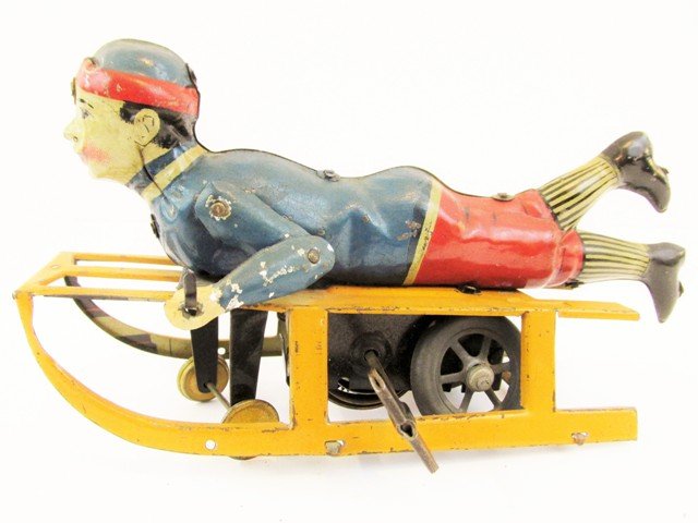 German Hess Boy On Sled Tin Wind-up (1 of 4)