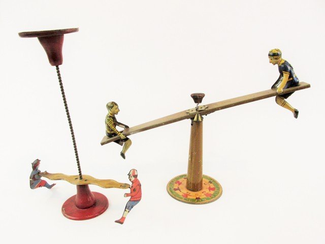 Two Early Tin Gravity Toys (1 of 7)