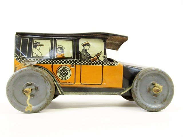 Mohawk Tin Checker Cab: Mohawk Toys litho tin Checker Cab with graphics of driver and passenger circa 1920, 6" L