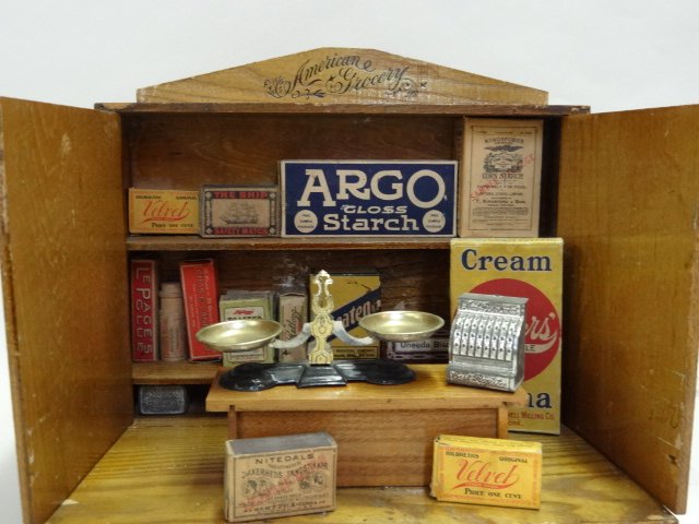 American Wood Grocery: Vintage American wood grocery store w/accessories, some food boxes not original to store, 9 in. x 3 in. x 13 in.