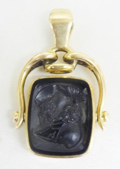 Gold Intaglio Watch Pendent: Gold black onyx swivel Intaglio watch fob turned into pendent, one side plain