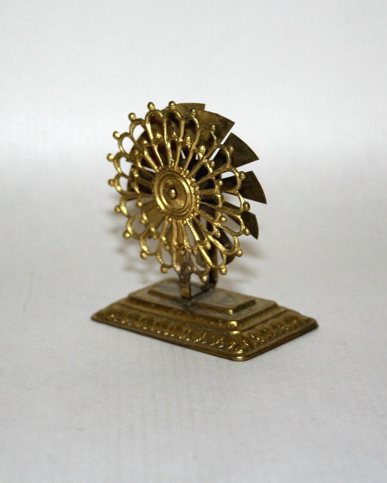 Rare Ormolu Fan: An Erhard & Sohne ormolu fan with revolving blades and an ornate base. 2" H and very rare.