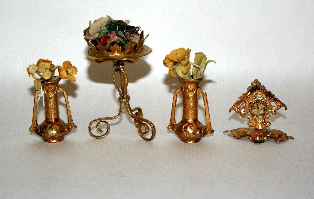Ormolu Plant Stand and Vases: A delicate three-legged ormolu table with jardiniÃ¨re filled with paper blooms 2.5" H, a pair of ormolu Art Nouveau vases with flowers and a mantel clock with slightly worn and faded face.