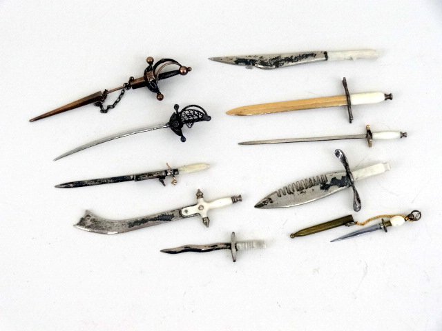 Joseph Gray Collection Handmade Weapons: Ten bladed weapons, many w/bone handles, some w/silver mounts, Kris dagger, Arabic sword, combination pistol sword, cutlasses, Bowie knife, broad sword