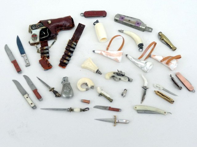 Joseph Gray Collection Hand Guns: Automatic pistol, devil & snake decorated w/holstered ammo, bone powder horns, guns, flasks, group of knives, pearl daggers, sword, etc.