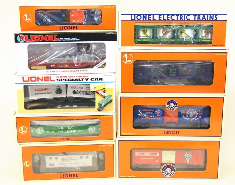 Lot of Nine Lionel Railroader Club Rolling Stock Cars: Lot of 9 Lionel Railroader Club cars, vat car 19940, box car 29939, aquarium car 19965, flat car 0781, searchlight car 16803, box car 19995, box car 29200, gondola 19966