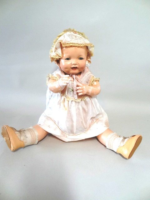 Effanbee Bubbles, Tagged Original Doll: Bubbles, 20" composition shoulder, head, arms and legs, cloth body, blue tin sleep eyes, tagged original clothing Effanbee heart necklace.