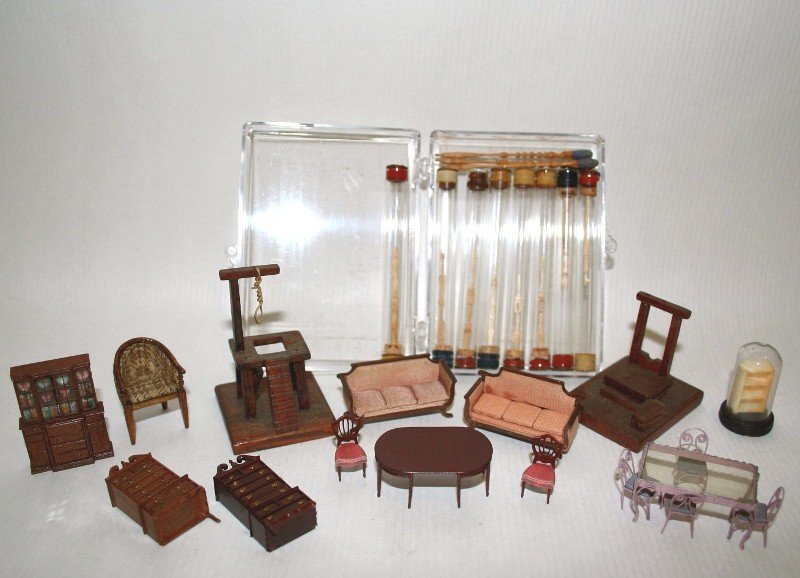 Frank Matter Micro-mini Furniture: An assortment of 1:48 scale furniture comprising two Sheraton sofas 1.5" L, a dining table and two chairs in good condition, and all the pieces for two highboys, a breakfront and two more chairs. The
