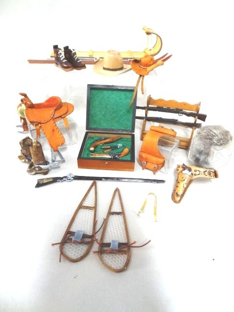 Dollhouse Miniature Dueling Set & Mens Accessories: Dueling Pistol set by Gun Smith in original box, several pairs of booths, Summerlots Leather style Cowboy hat, Bobsled, Leather tooled Holster, raccoon Cap, Ski's, Snow Shoes, Saddles, Saddle Bags, Gu