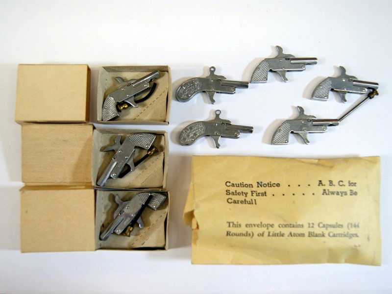 Eight  Japanese Miniature Cap Pistols (1 of 4)