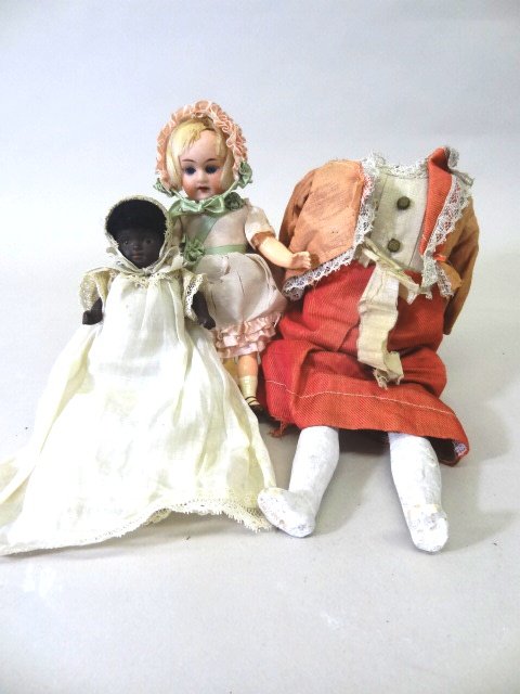 Two Small Bisque Dolls and Body (1 of 1)