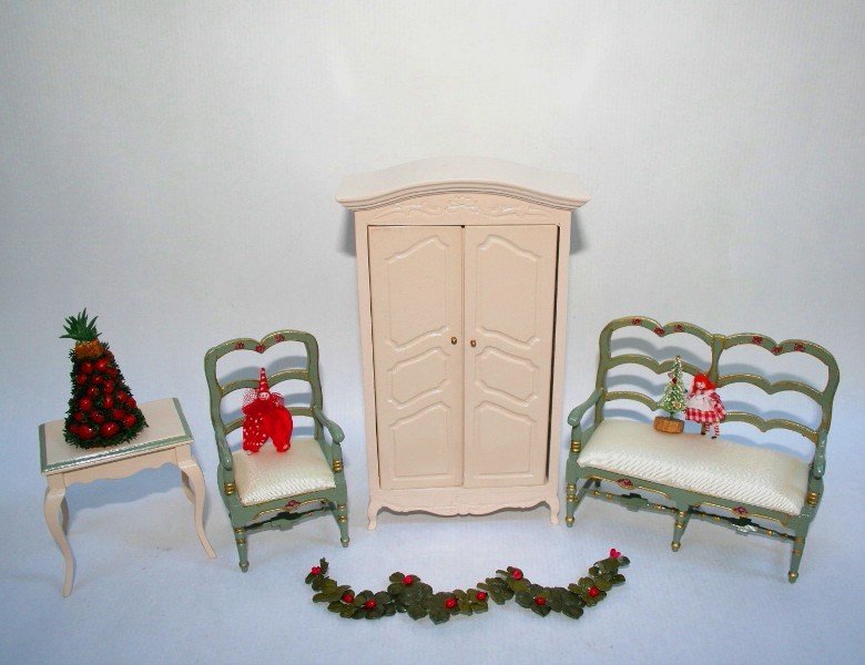 French Furniture and Christmas: A pretty painted settee3.75" H, 4.5" L with matching a chair, appointed armoire and table with a few holiday-themed accessories.