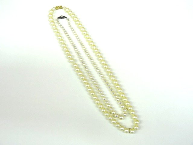 Peal Necklaces: 15" Strand of Real Peals and a strand of Mikimoto Pearls 19 1/2"