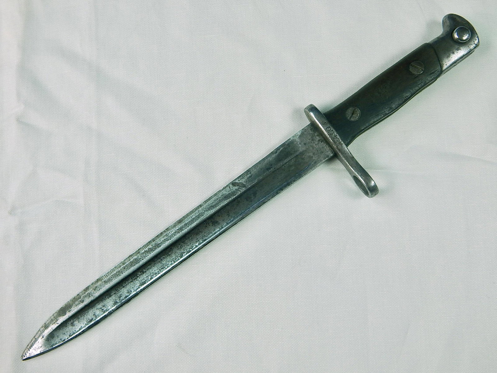 Spanish Spain WW1 Model 1892-93 German Mauser Bayonet: Original Spanish WW1 Model 1892-93 German Made Mauser Bayonet. No scabbard. Push button works. 14 5/8" long with 9 3/4" blade.