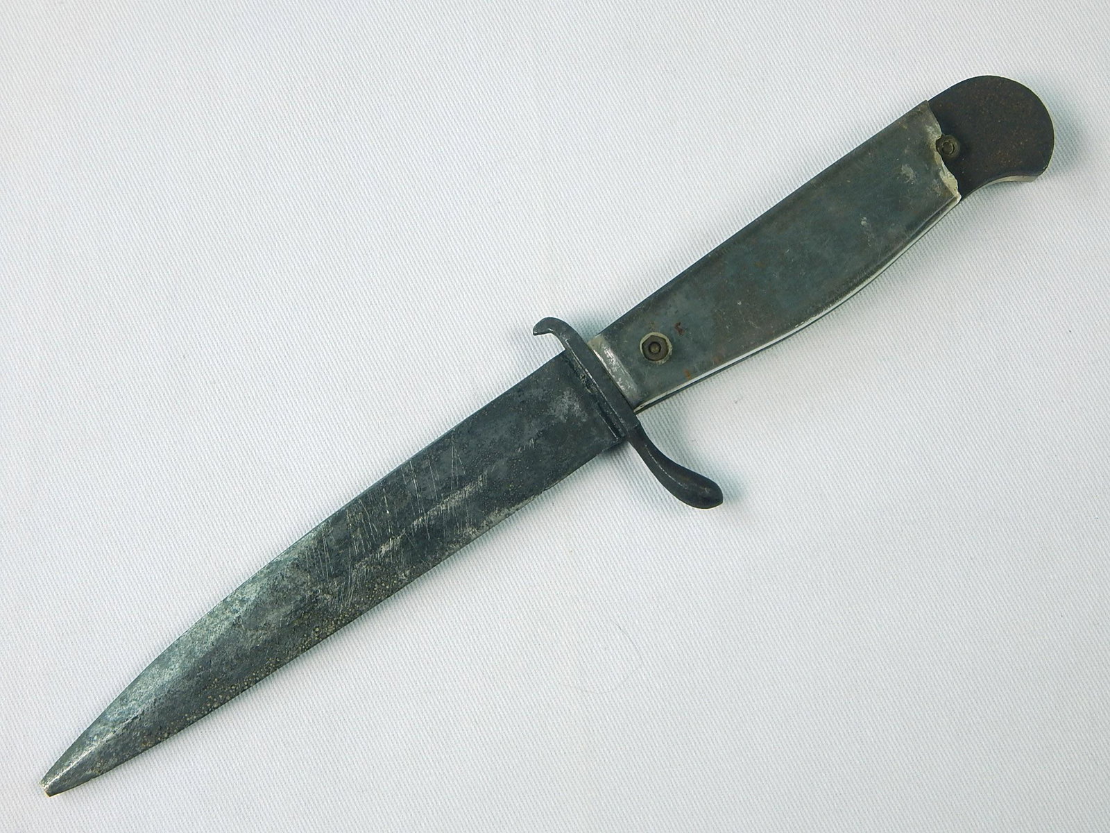 German Germany WW2 Boot Fighting Knife: German WW2 Boot Fighting Knife. No scabbard. Handle grips are replaced, damaged. 9 3/4" long with 5 3/8" blade.