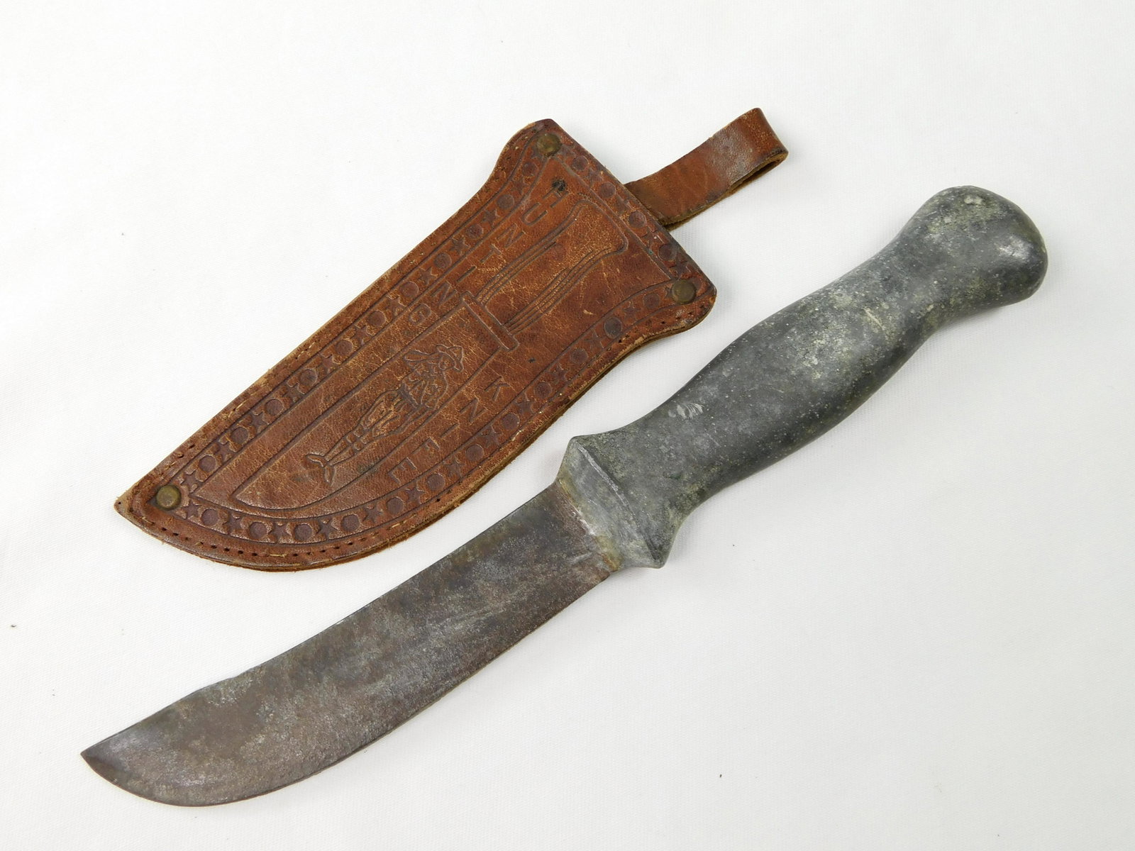 US WW2 Custom Made Aluminum Theater Fighting Knife: US WW2 Custom Handmade Aluminum THEATER Fighting Knife with Boy Scout Leather Sheath. Solid. The sheath is missing sewing. Size: 9 5/8" total length, the blade is 4 3/4".