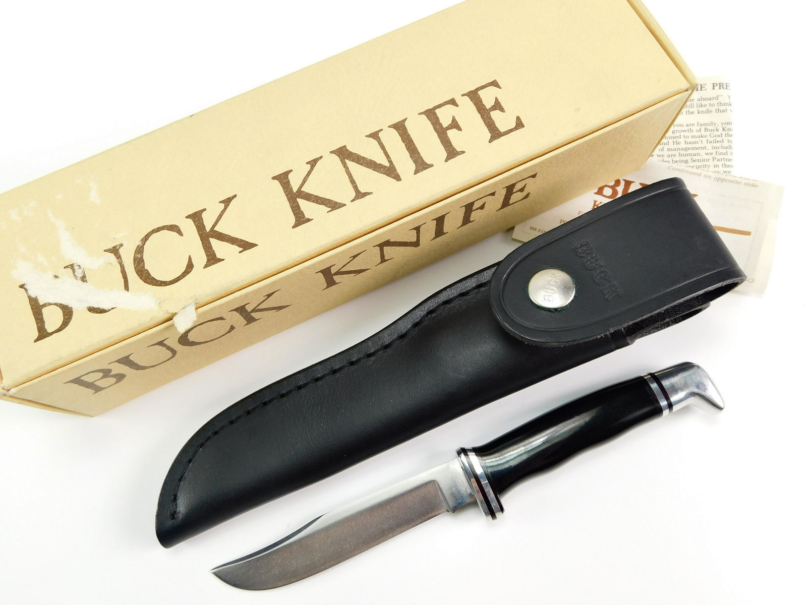 Vintage 1973-85 Pre Date Code BUCK 102 Woodsman Knife: Vintage US 1973-85 Pre Date Code BUCK 102 Woodsman Knife with Leather Sheath and Box. New old stock. The knife is solid, with no loose parts. Size: 7 7/8" total length, the blade is 4".