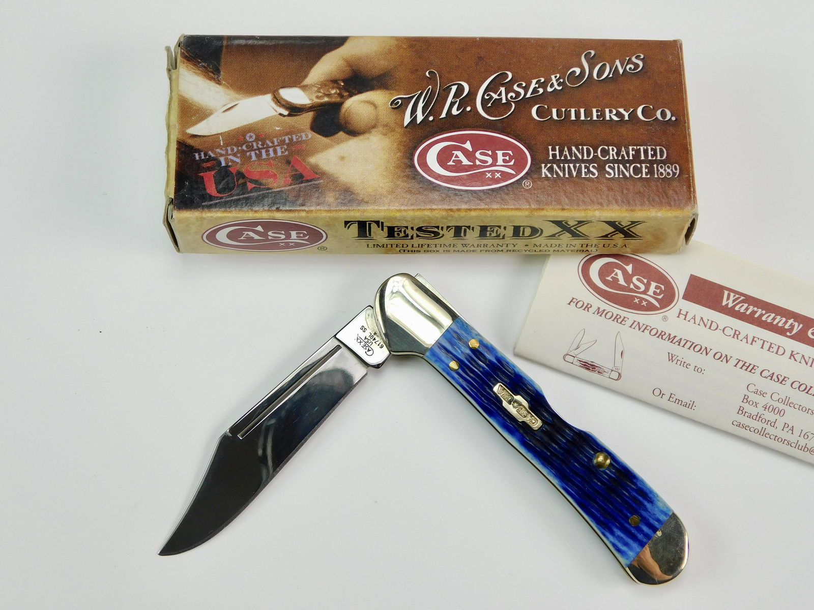 2009 Case XX Tested 61749L SS Copperlock Folding Knife: US 2009 Case XX Tested 61749L SS Mini Copperlock Blue Folding Pocket Knife with Box. New old stock. The blade snaps, no wobble. Measurements are pictured.