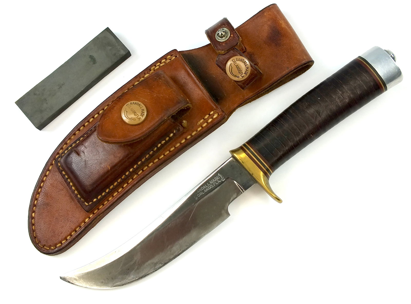 Vintage US Custom Handmade Randall Hunting Knife Heiser: Original Vintage US Custom Handmade Randall Hunting Knife with Heiser Brown Button Sheath and sharpening stone. 9 3/4" long with 5 1/8" blade.