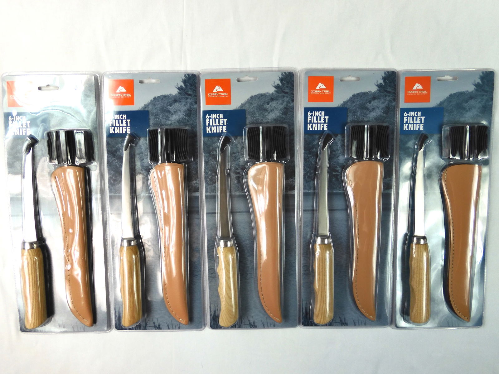 Lot of 5 Ozark Trail 6" Blade Fishing Fish Fillet Knife: Lot of 5 Ozark Trail 6" Blade Fishing Knives with Scabbards and Sharpeners. New old stock.
