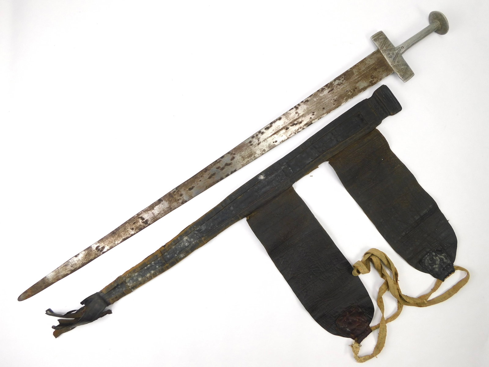 Antique Vintage Old North African Africa Sword w/ Scabbard: Original Antique North African Sword with Leather Scabbard. Scabbard is in fair condition, pictured. 36 1/4" total length. Blade is 31 1/2".