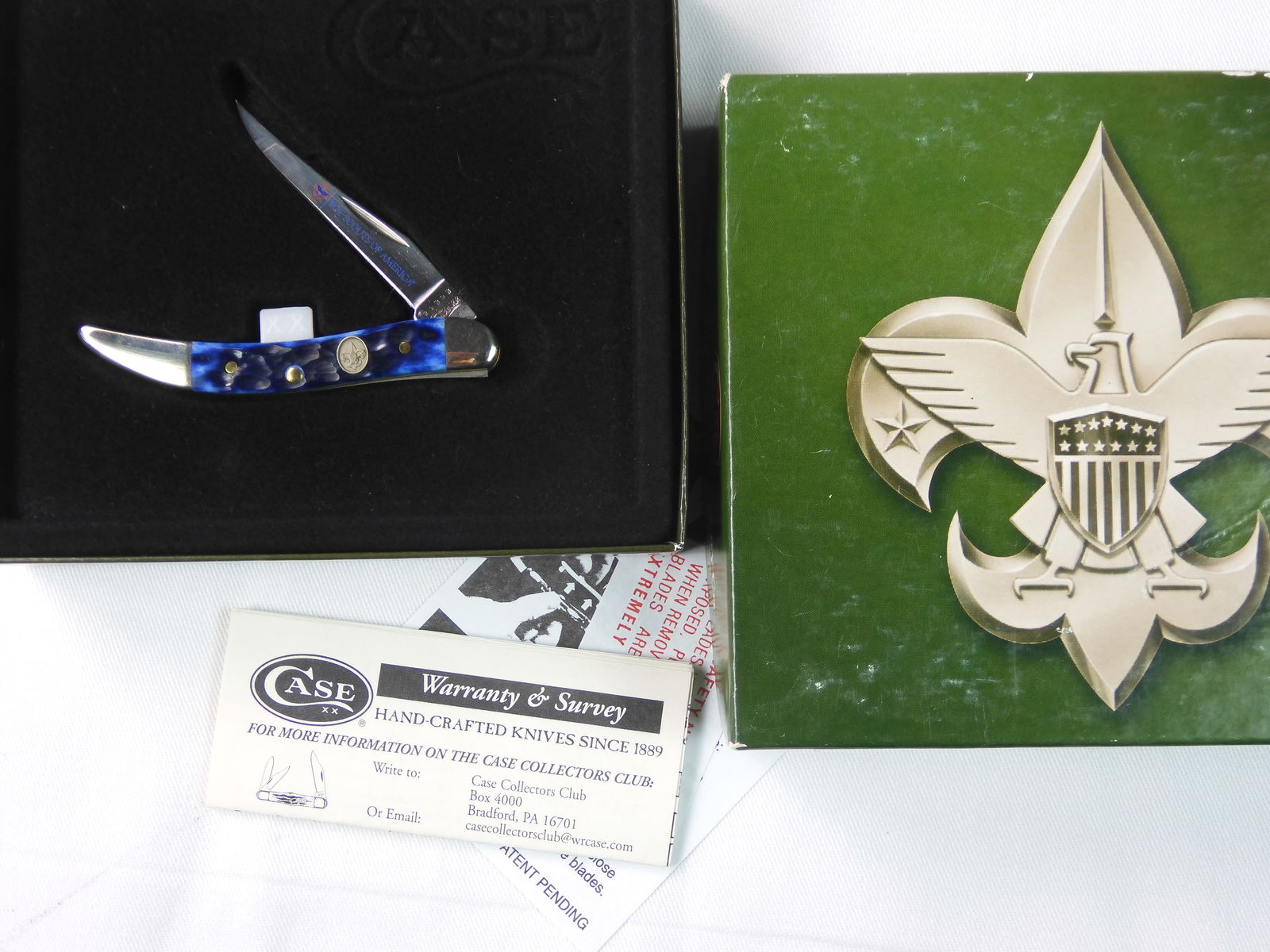 2010 Case XX Tiny Toothpick 610096 SS Scout Folding Knife: US 2010 Case XX Tiny Toothpick 610096 SS Navy Blue. Folding Pocket Knife with Box. Blade snaps, no wobble. Measurements are pictured.