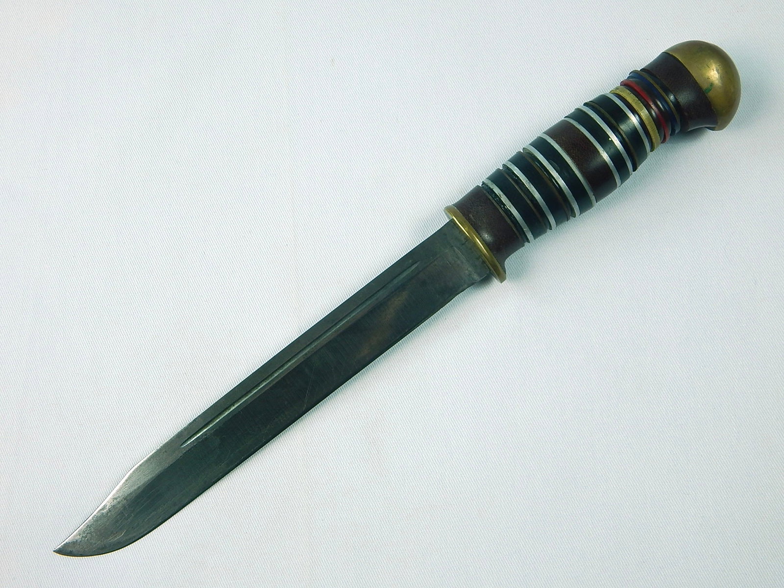 US WW2 Custom Handmade Theater Fighting Knife: US WW2 Custom Handmade Theater Fighting Knife. No scabbard. Handle rings are loose. 12" long with 7 1/2" blade.