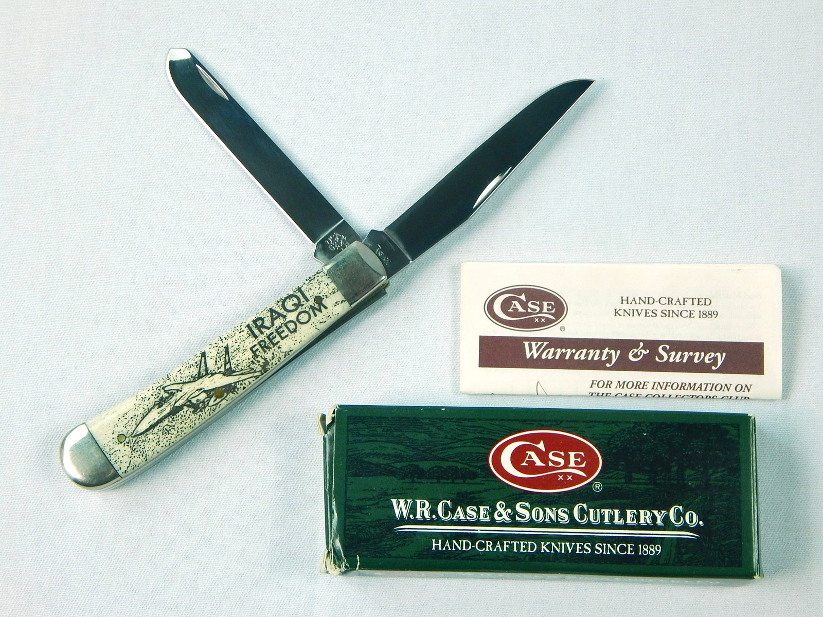 US CASE XX Iraqi Freedom Trapper 2 Blade Folding Knife: US CASE XX Iraqi Freedom Trapper 2 Blades Folding Pocket Knife. With box. Never used. Measurements are pictured.