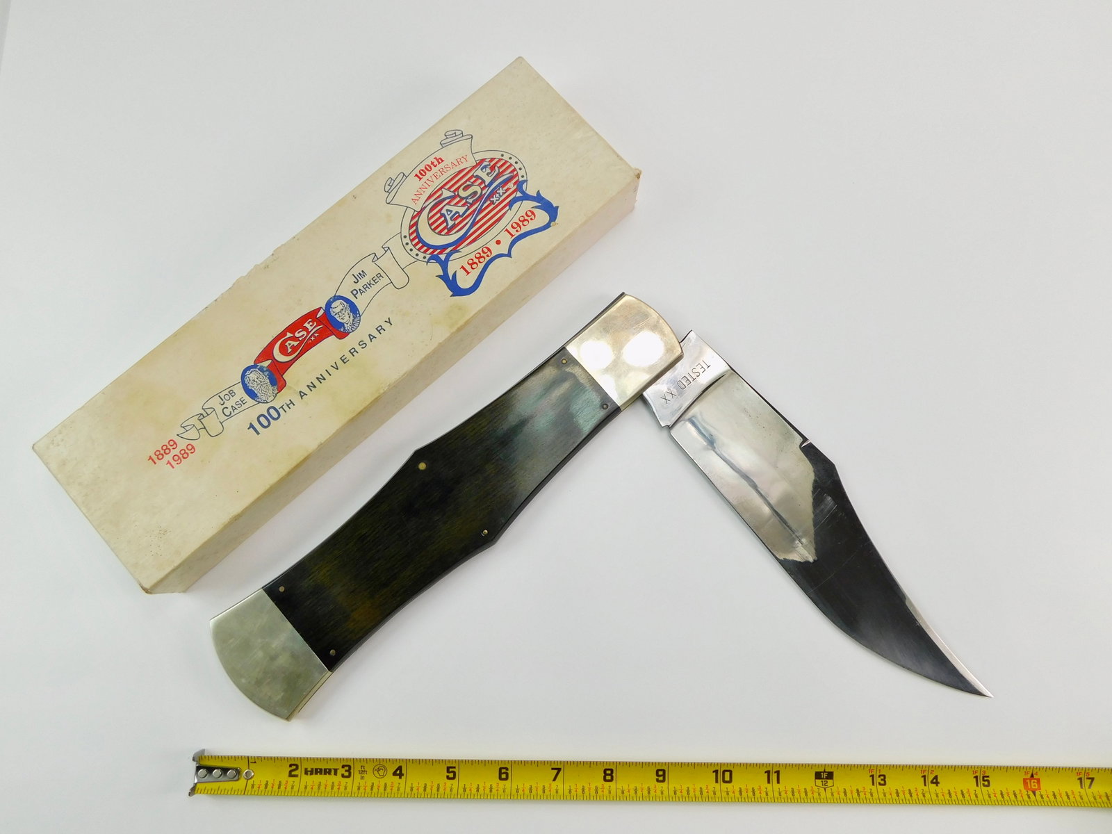 US 1989 CASE Tested XX 100 Anniv. HUGE Folding Knife: US 1989 CASE Tested XX 100th Anniversary Huge Folding Knife with Box. Blade snaps both ways, no wobble. Measurements are pictured.