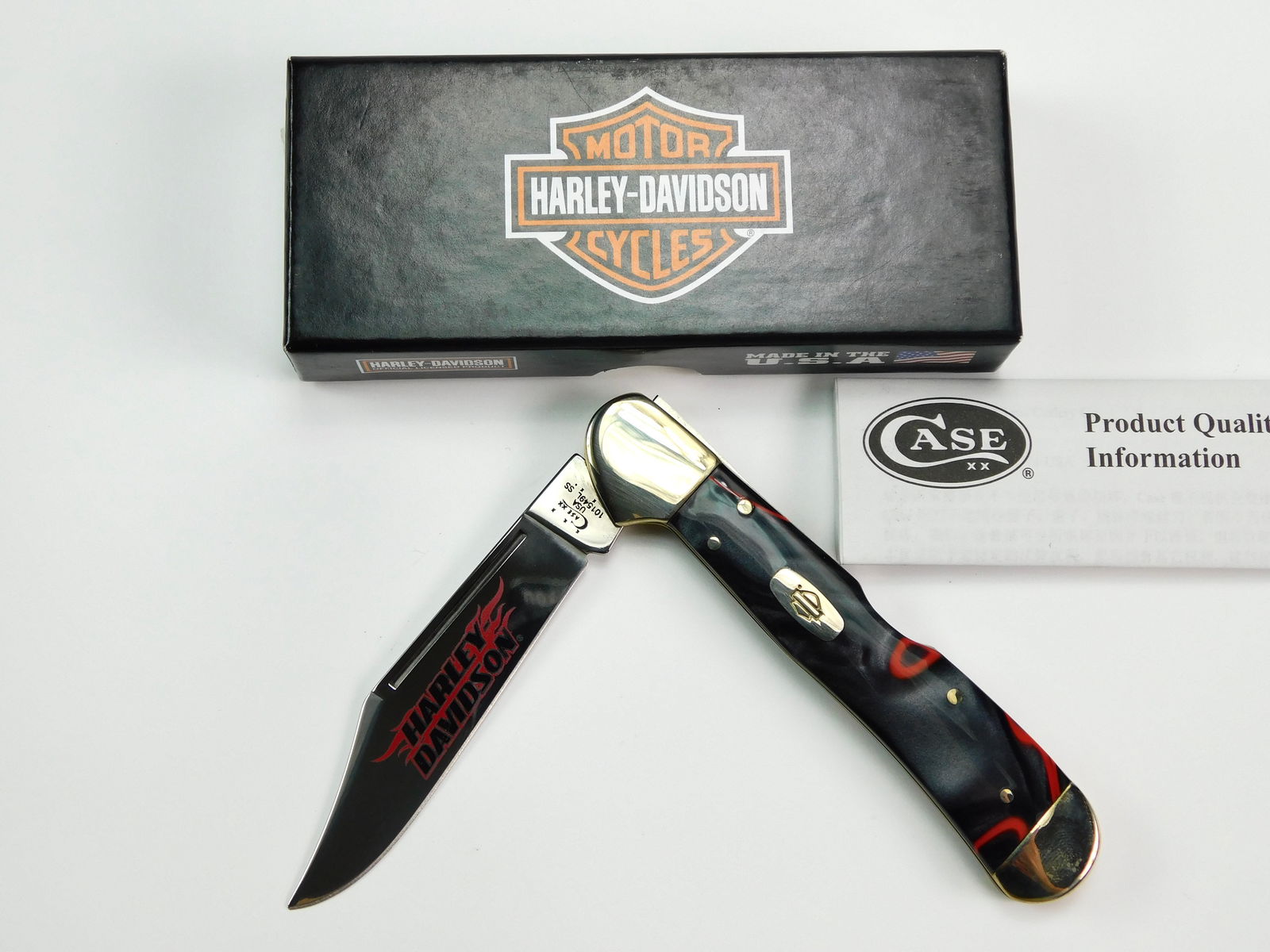 2014 Case XX Tested 101549L SS Copperlock Folding Knife: US 2014 Case XX Tested 101549L SS Copperlock Lava Harley Davidson Folding Pocket Knife with Box. New old stock. Measurements are pictured.