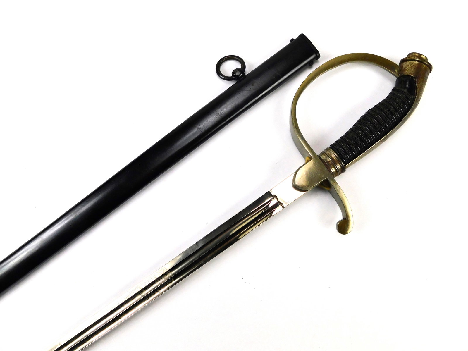 Antique German Germany WW1 Engraved Officer Sword: German WW1 Officer's Sword with Scabbard. Handle parts are a little bit loose. 37 3/4" total length. The blade is 32 1/4".
