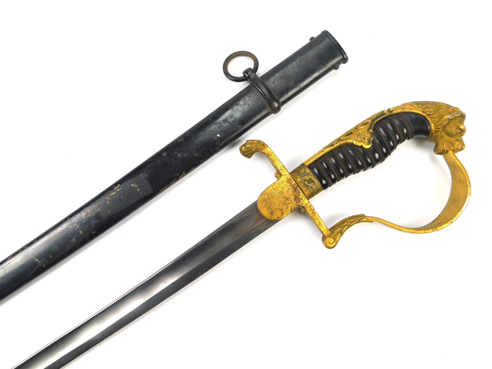 German Germany Antique WW1 Lion Head Officer's Sword w/ Scabbard: German WW1 Lion Head Officer's Sword with Scabbard. Solid. 34 5/8" total length. The blade is 29 3/8".